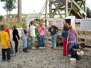 Kids love to see the goats, find pumpkins and explore the farm on school field trips to Howell's Pumpkin Patch in Cummings, Iowa. 